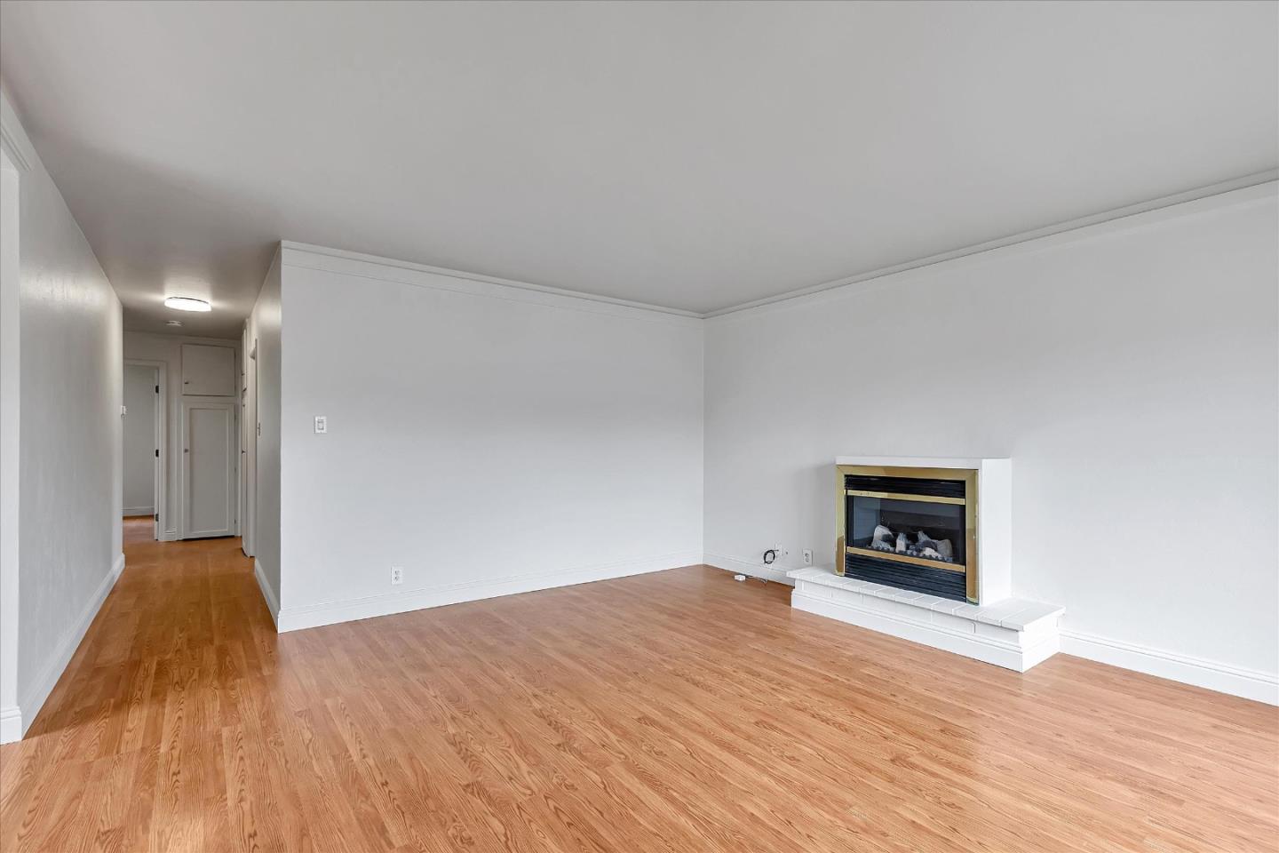 728 Arguello Boulevard Pacifica, CA 94044 - Photo 7 of 34 a view of empty room with a fireplace