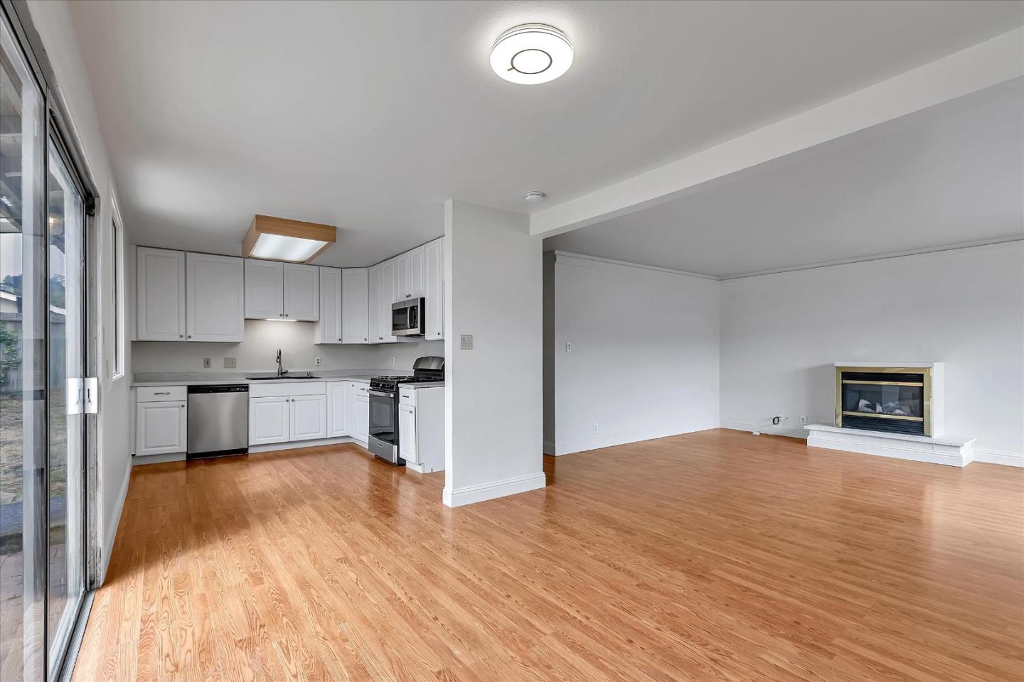 728 Arguello Boulevard Pacifica, CA 94044 - Photo 8 of 34 a view of kitchen with sink and microwave