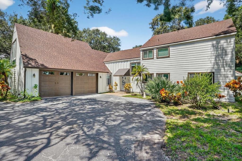 a house with yard and a garden