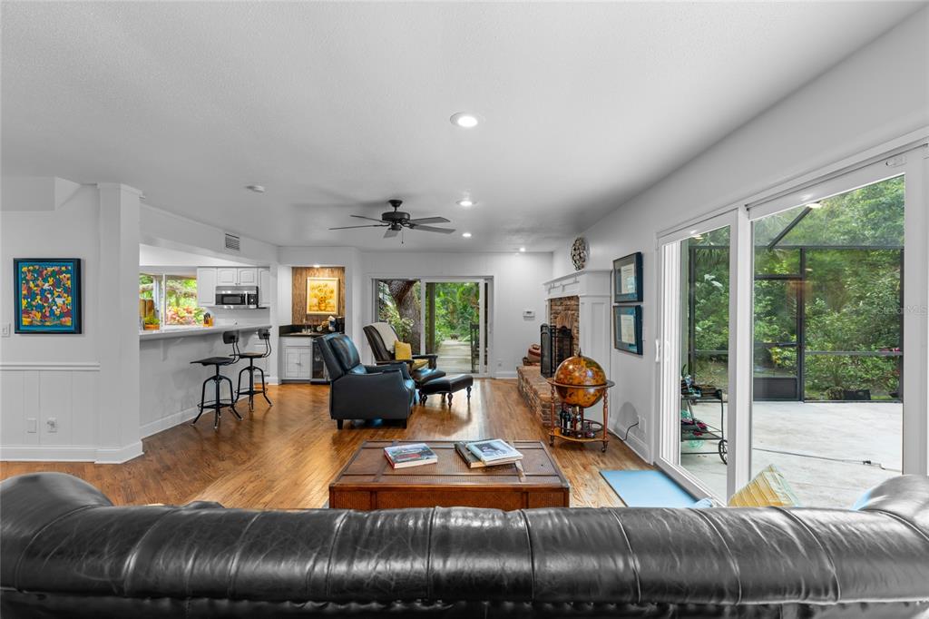 120 Beach Street Ponce Inlet, FL 32127 - Photo 11 of 91 a living room with furniture and a large window