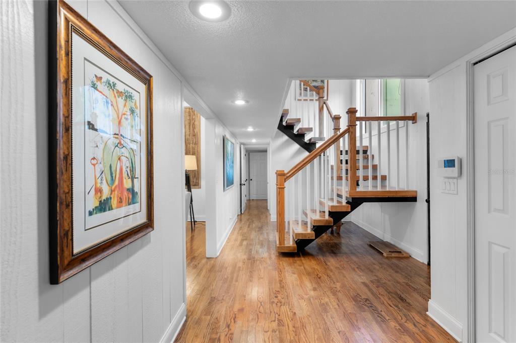 120 Beach Street Ponce Inlet, FL 32127 - Photo 27 of 91 a view of entryway with wooden floor
