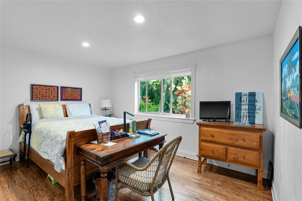 120 Beach Street Ponce Inlet, FL 32127 - Photo 30 of 91 a living room with furniture and a flat screen tv