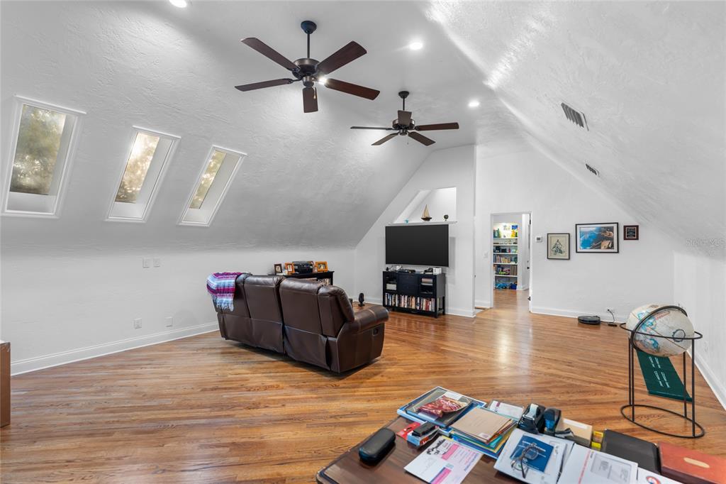 120 Beach Street Ponce Inlet, FL 32127 - Photo 53 of 91 a living room with furniture and a flat screen tv