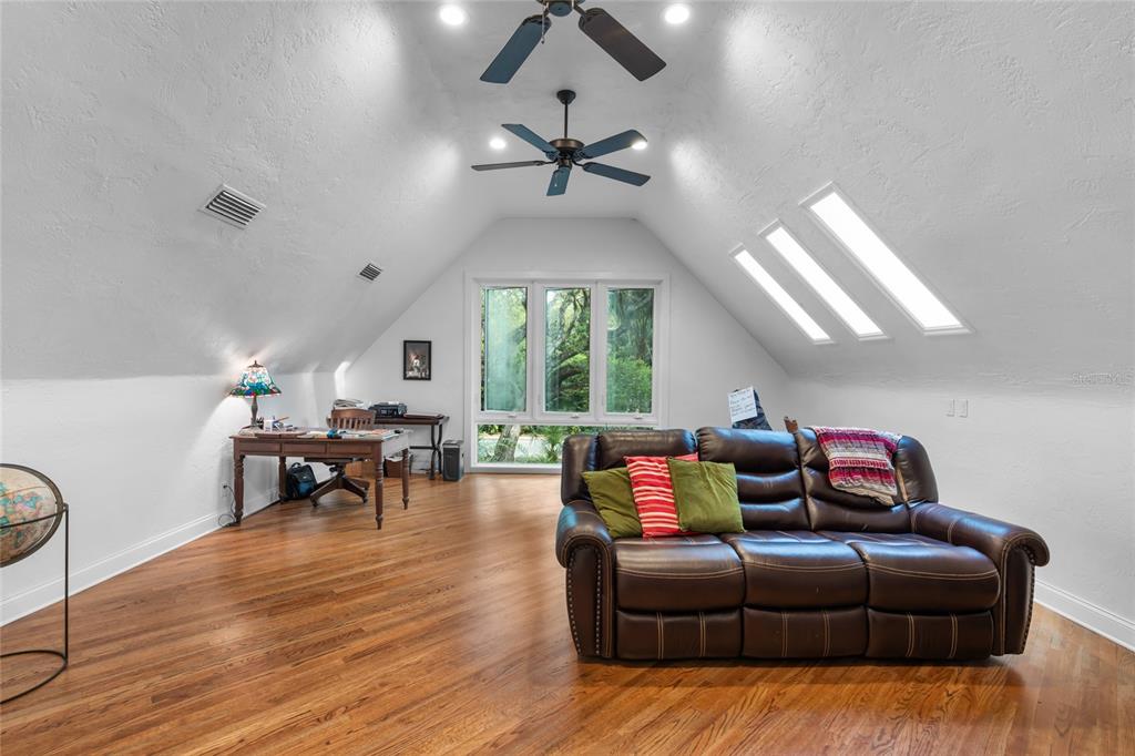 120 Beach Street Ponce Inlet, FL 32127 - Photo 54 of 91 a living room with furniture and a large window
