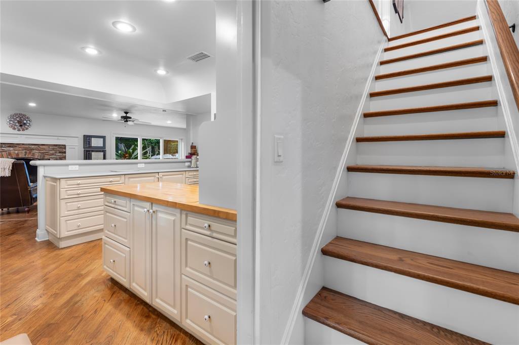 120 Beach Street Ponce Inlet, FL 32127 - Photo 56 of 91 a view of a kitchen with cabinets and stairs