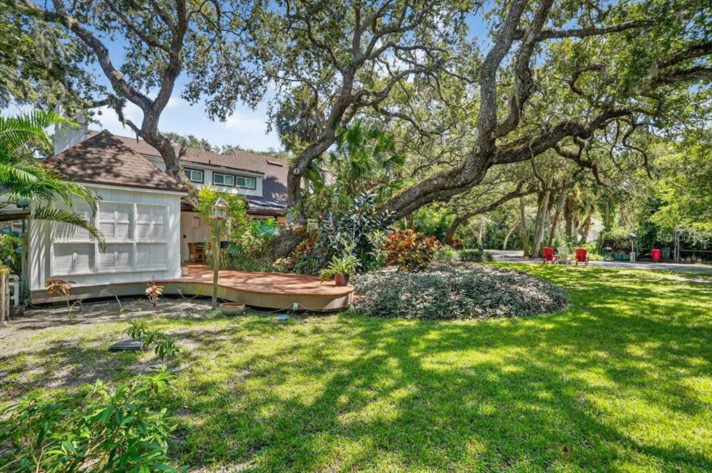 120 Beach Street Ponce Inlet, FL 32127 - Photo 81 of 91 a view of a house with backyard and sitting area