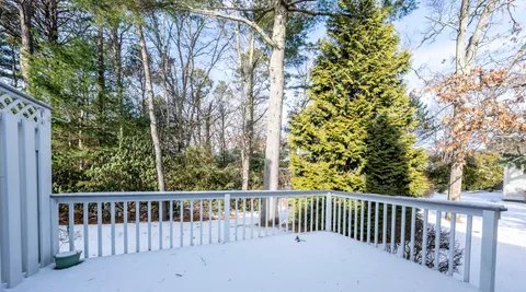 a view of a wooden roof deck