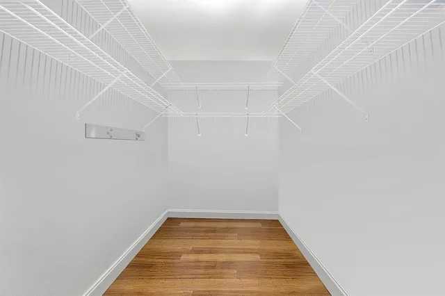 a utility room with sink dryer and washer