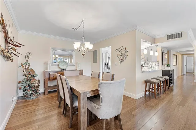 a kitchen with lots of counter top space and sink