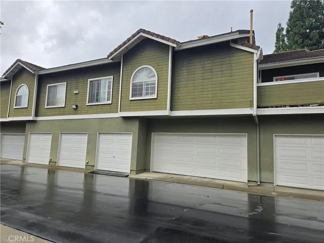 a front view of a house with street