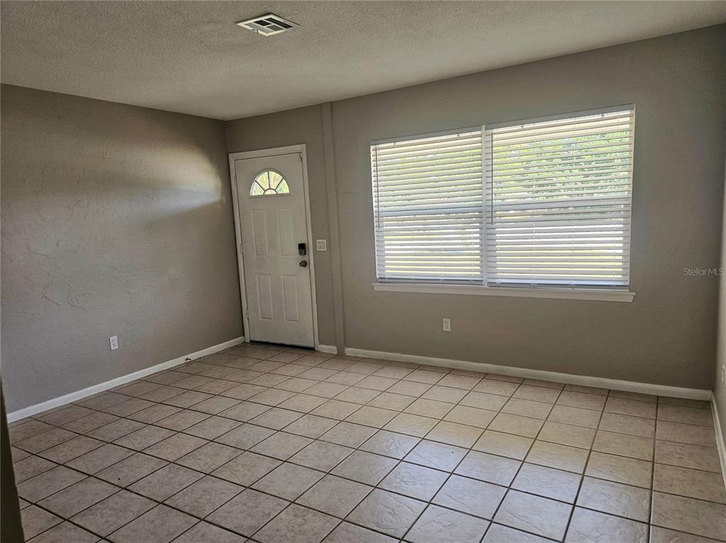 7000 Brentford Road Sarasota, FL 34241 - Photo 5 of 29 a view of an empty room and window