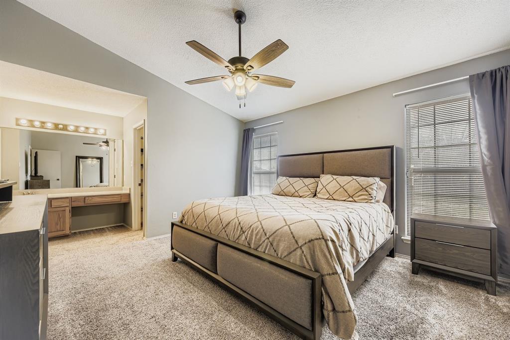 424 Benjamin Lane Arlington, TX 76002 - Photo 10 of 19 Primary Bedroom and ensuite bathroom