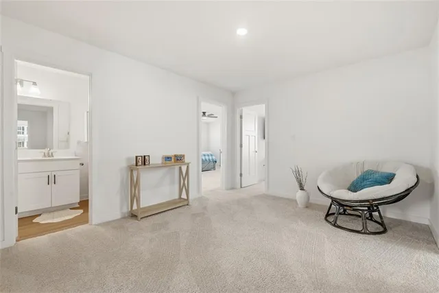 a living room with furniture and a table