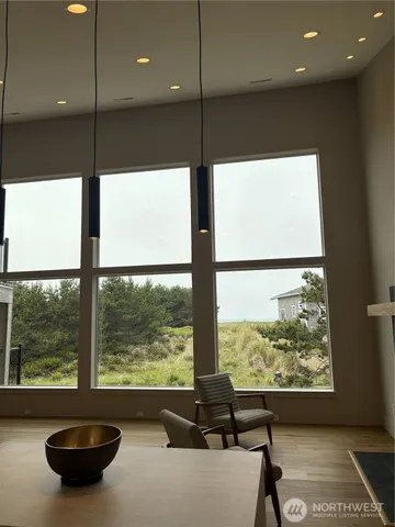 a view of an empty room with a large window