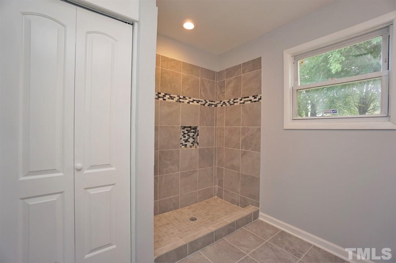 700 Darby Street Raleigh, NC 27610 - Photo 15 of 23 a bathroom with a shower