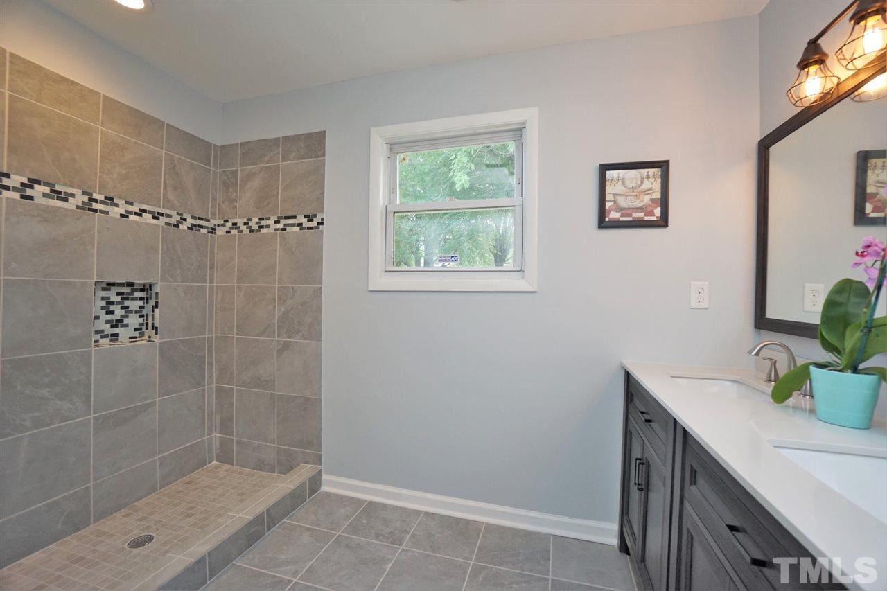 700 Darby Street Raleigh, NC 27610 - Photo 16 of 23 a bathroom with a shower