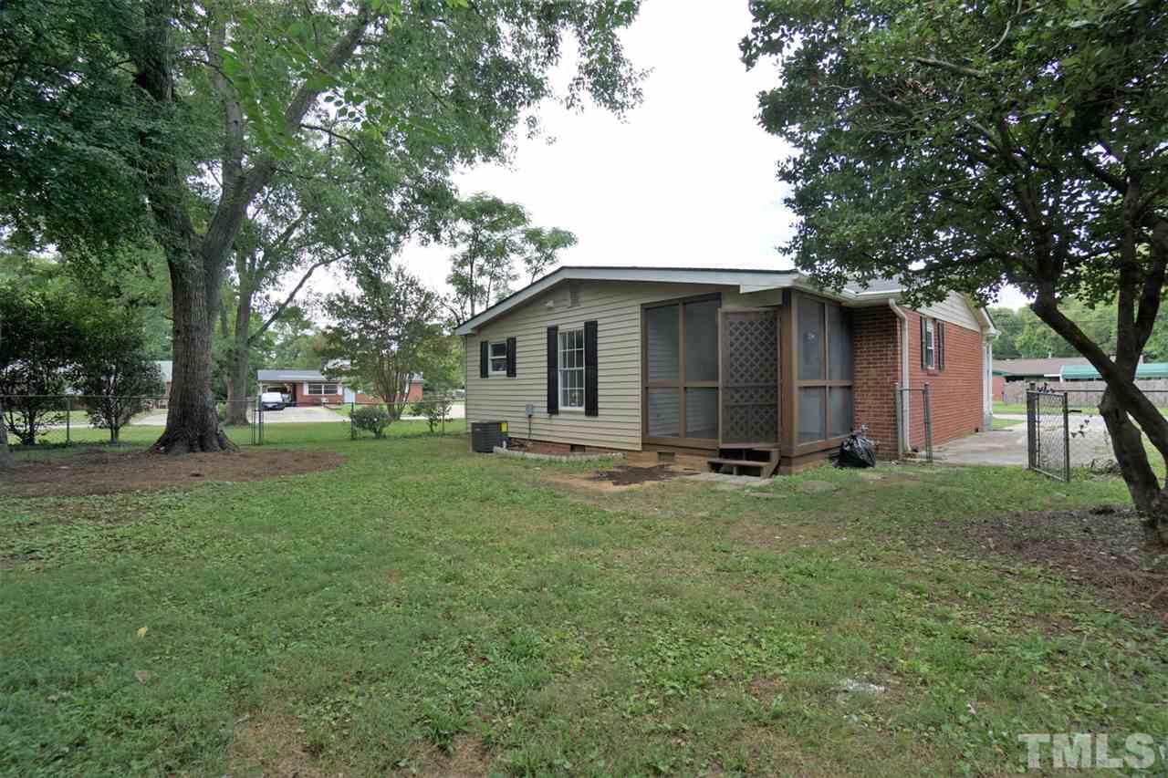 700 Darby Street Raleigh, NC 27610 - Photo 23 of 23 a view of a house with backyard and trees