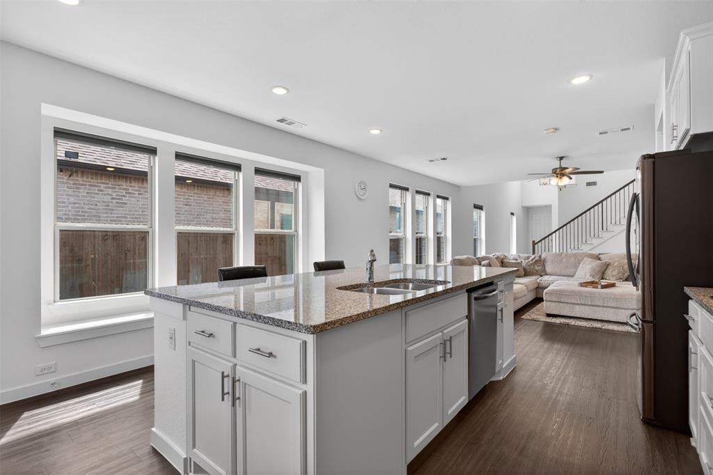 629 Claverton Lane Forney, TX 75126 - Photo 6 of 33 a kitchen with counter top space and sink