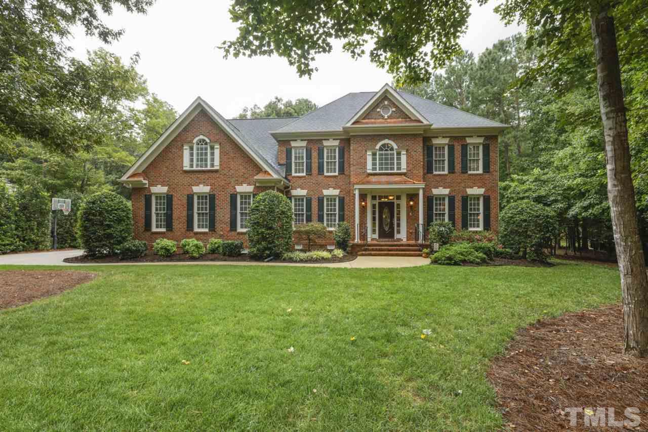 Prisitine Custom Home on Gorgeous Private Lot in Ethans Glen! 3 Sided Brick, 3 Car Side Entry Garage with Large Parking Pad. Expansive Park Like Yard!