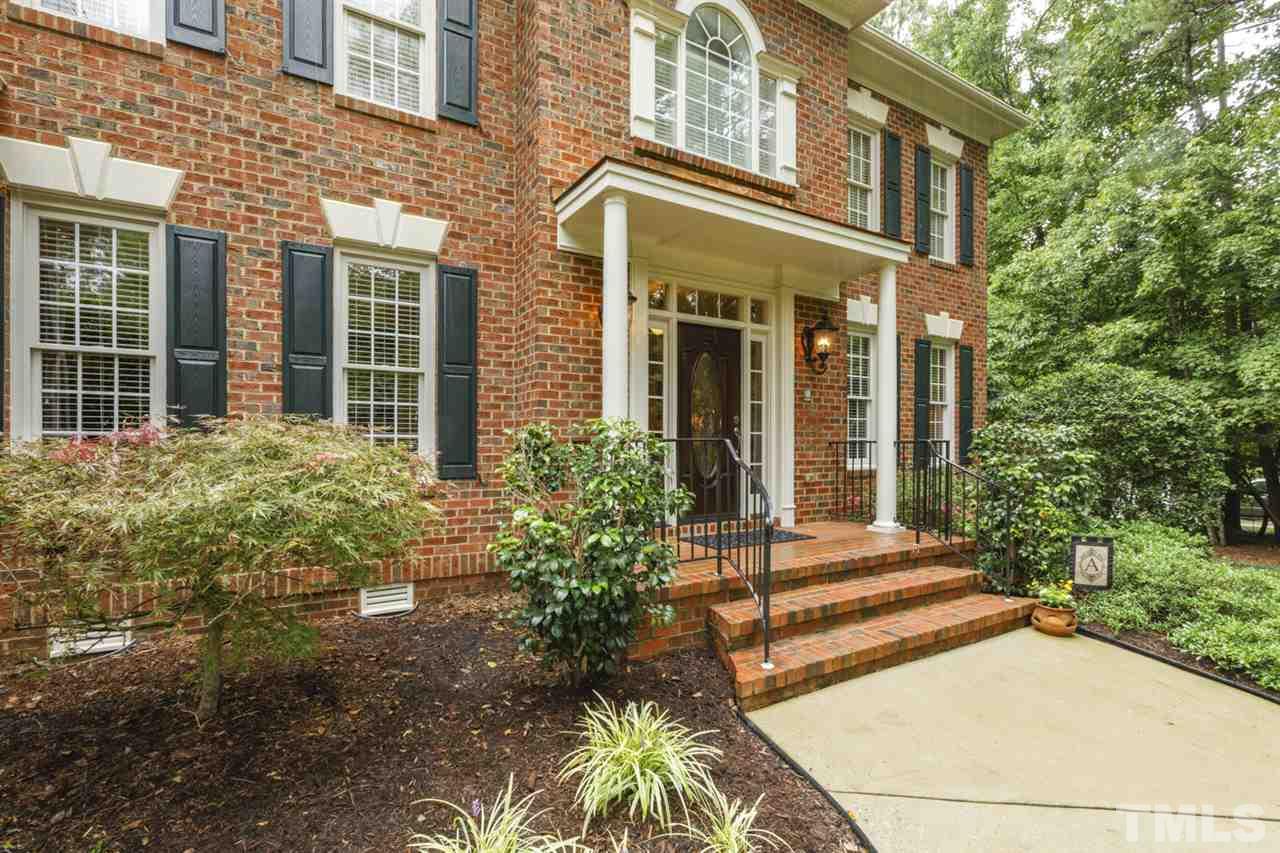 1009 Quiet Ridge Circle Raleigh, NC 27614 - Photo 2 of 30 Meticulously maintained home with landscaped lawn and striking craftsmanship. Covered entry