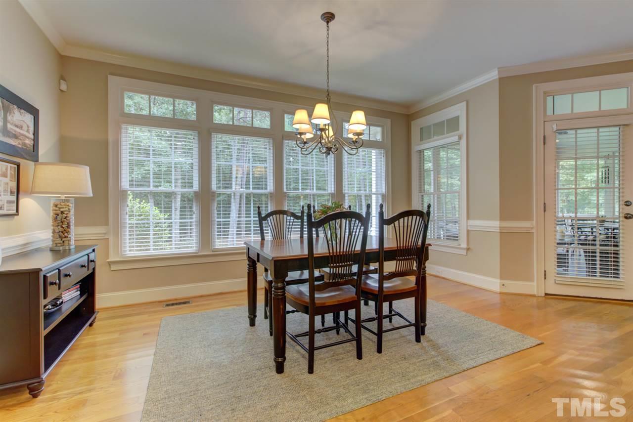 1009 Quiet Ridge Circle Raleigh, NC 27614 - Photo 12 of 30 Oversize Breakfast Nooks with Wall of Windows to enjoy gorgeous back lawn