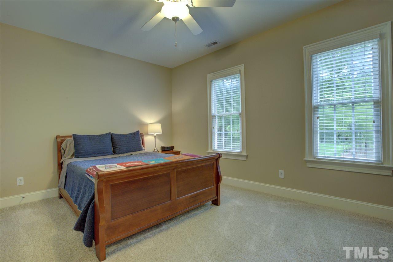 1009 Quiet Ridge Circle Raleigh, NC 27614 - Photo 20 of 30 Spacious secondary bedroom. All bedrooms with adjoining full bathroom!