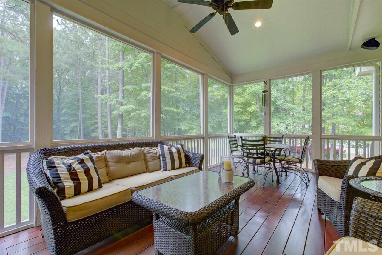 1009 Quiet Ridge Circle Raleigh, NC 27614 - Photo 25 of 30 Gorgeous Spacious Screen Porch with IPE flooring and ceiling fan