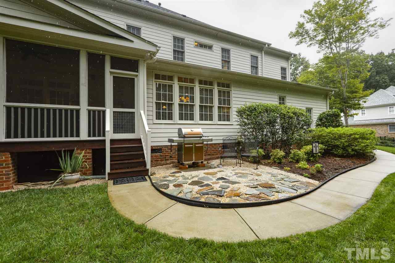 1009 Quiet Ridge Circle Raleigh, NC 27614 - Photo 27 of 30 Back Yard is like having your own park! Lovely Patio space to enjoy your view!