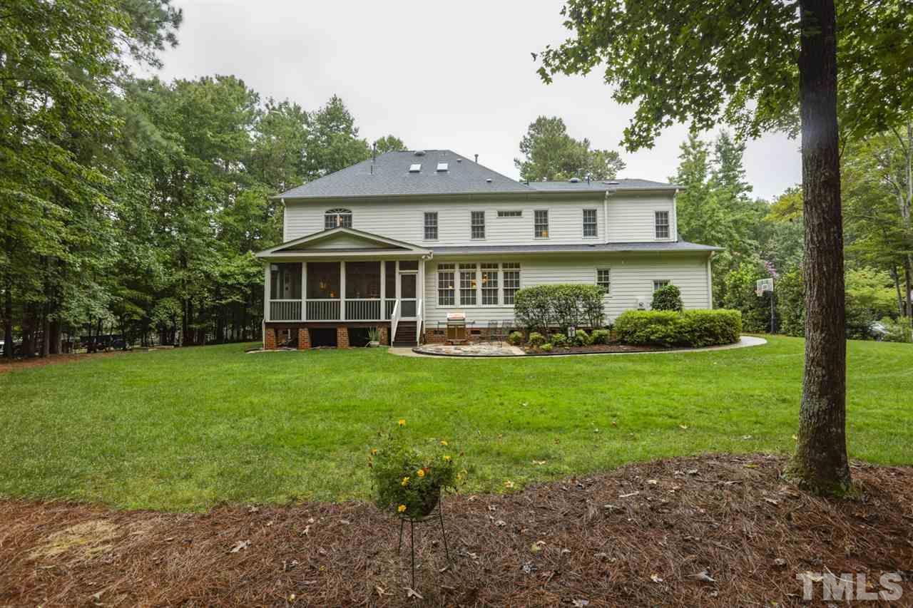 1009 Quiet Ridge Circle Raleigh, NC 27614 - Photo 28 of 30 Private Landscaped Back Yard with Lawn & Natural Area