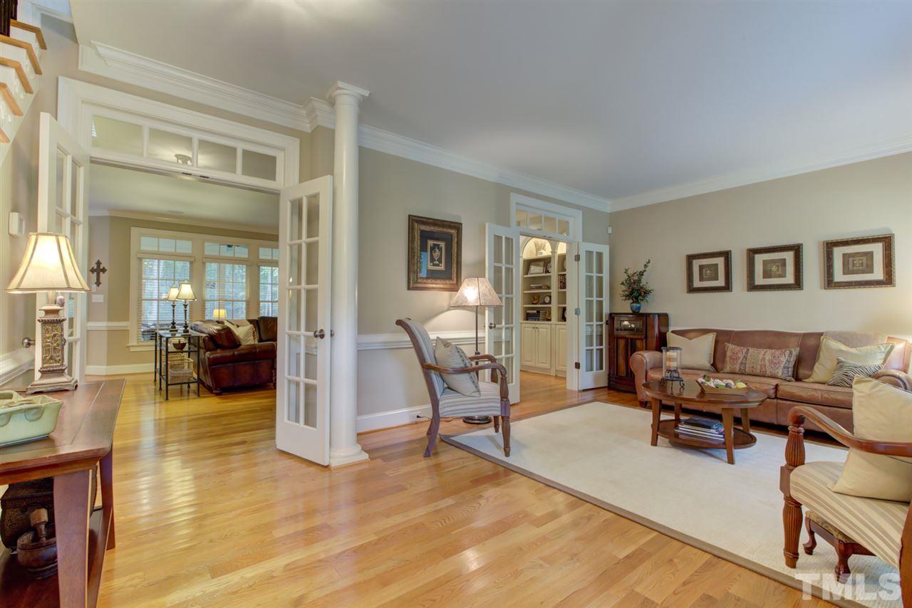 1009 Quiet Ridge Circle Raleigh, NC 27614 - Photo 4 of 30 Elegant and Inviting Living Room Flows Beautifully Into Family Room