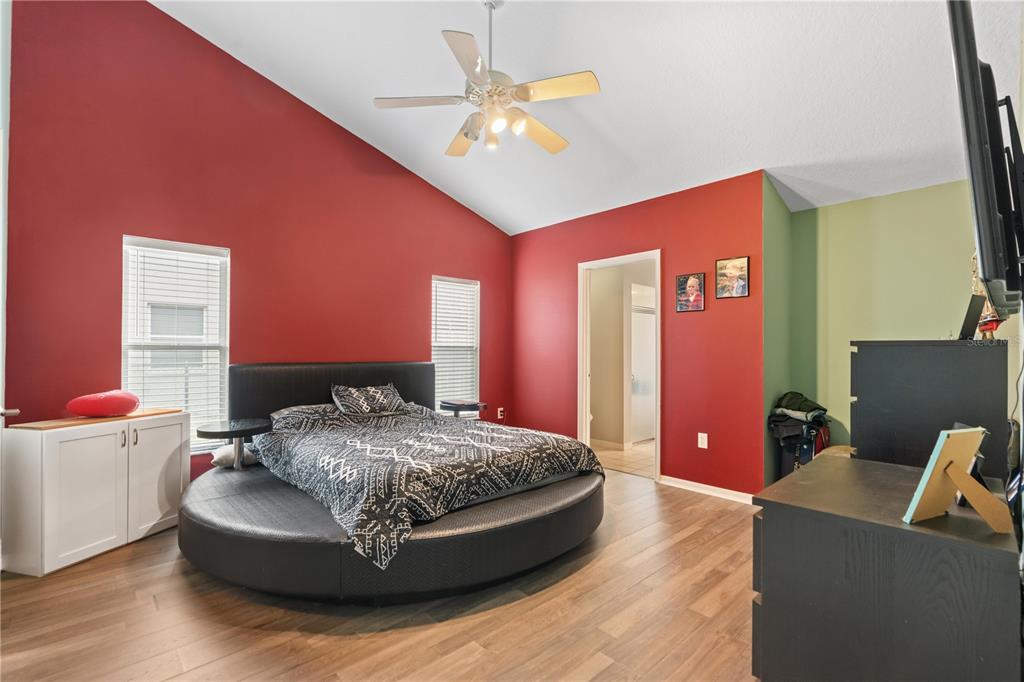 7466 Apache Trail Spring Hill, FL 34606 - Photo 19 of 27 a living room with furniture and a flat screen tv