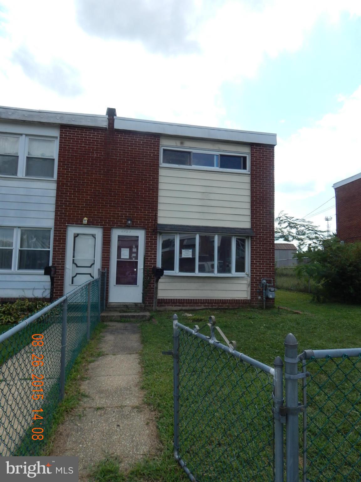 2757 Yarnall Road Baltimore, MD 21227 - Photo 1 of 11 a front view of a house with a garden