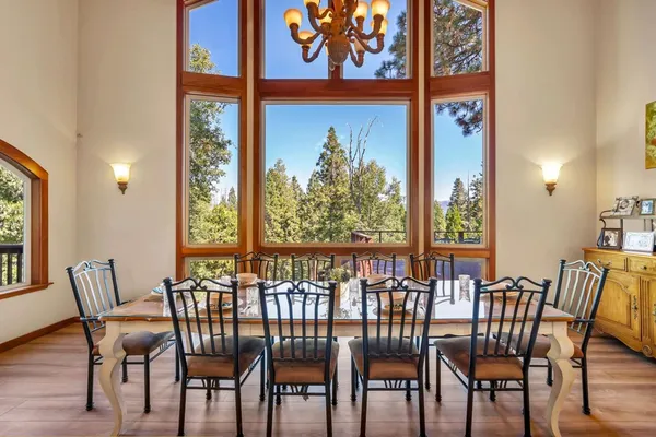 a view of a chairs and table in patio