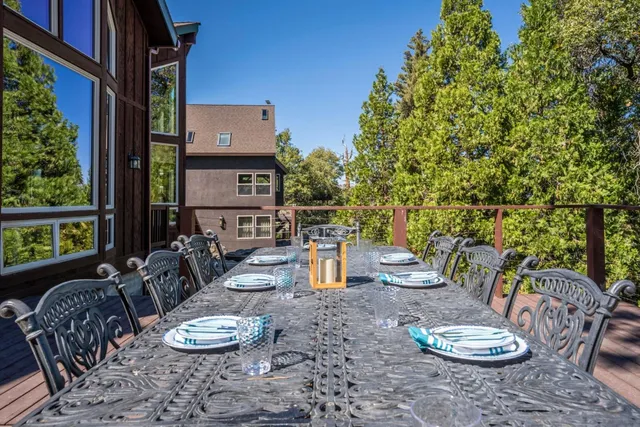 a view of a table and chairs in the patio