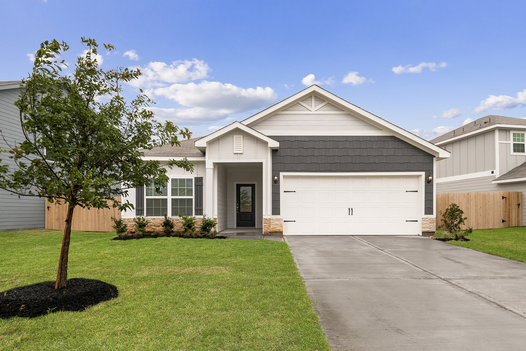 356 Fastboy Lane Waller, TX 77484 - Photo 1 of 23 a front view of a house with a yard and trees