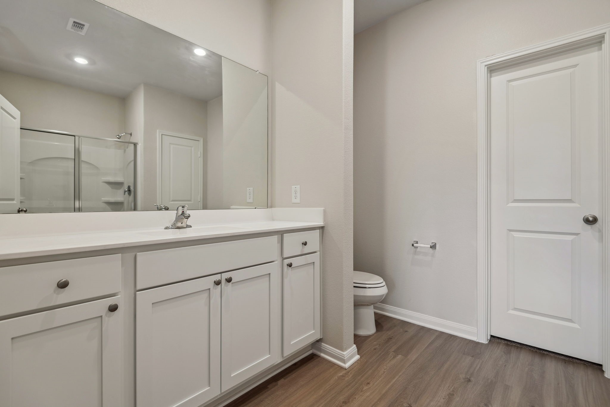 356 Fastboy Lane Waller, TX 77484 - Photo 21 of 23 a bathroom with a double vanity sink and a mirror