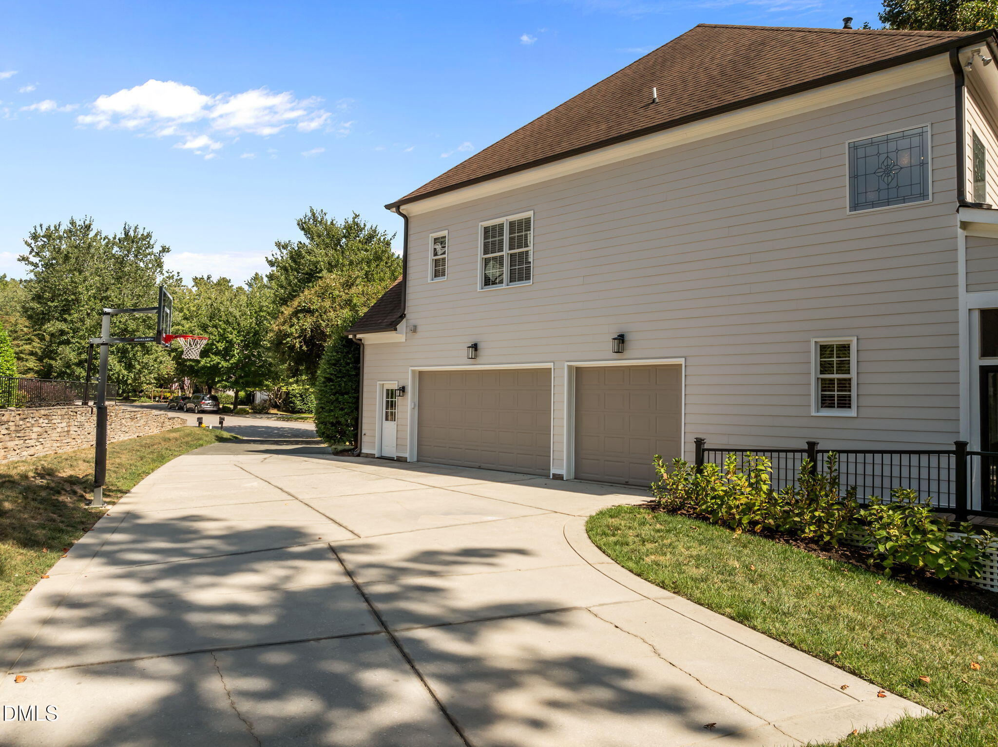 8802 Fidelis Lane Raleigh, NC 27613 - Photo 48 of 60 a front view of a house with a yard and garage