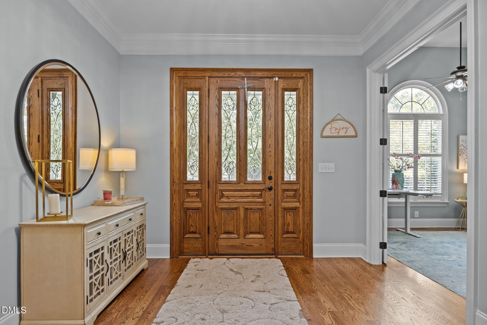 8802 Fidelis Lane Raleigh, NC 27613 - Photo 6 of 60 a view of an entryway with wooden floor