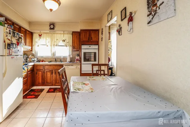 a view of a livingroom with furniture and window