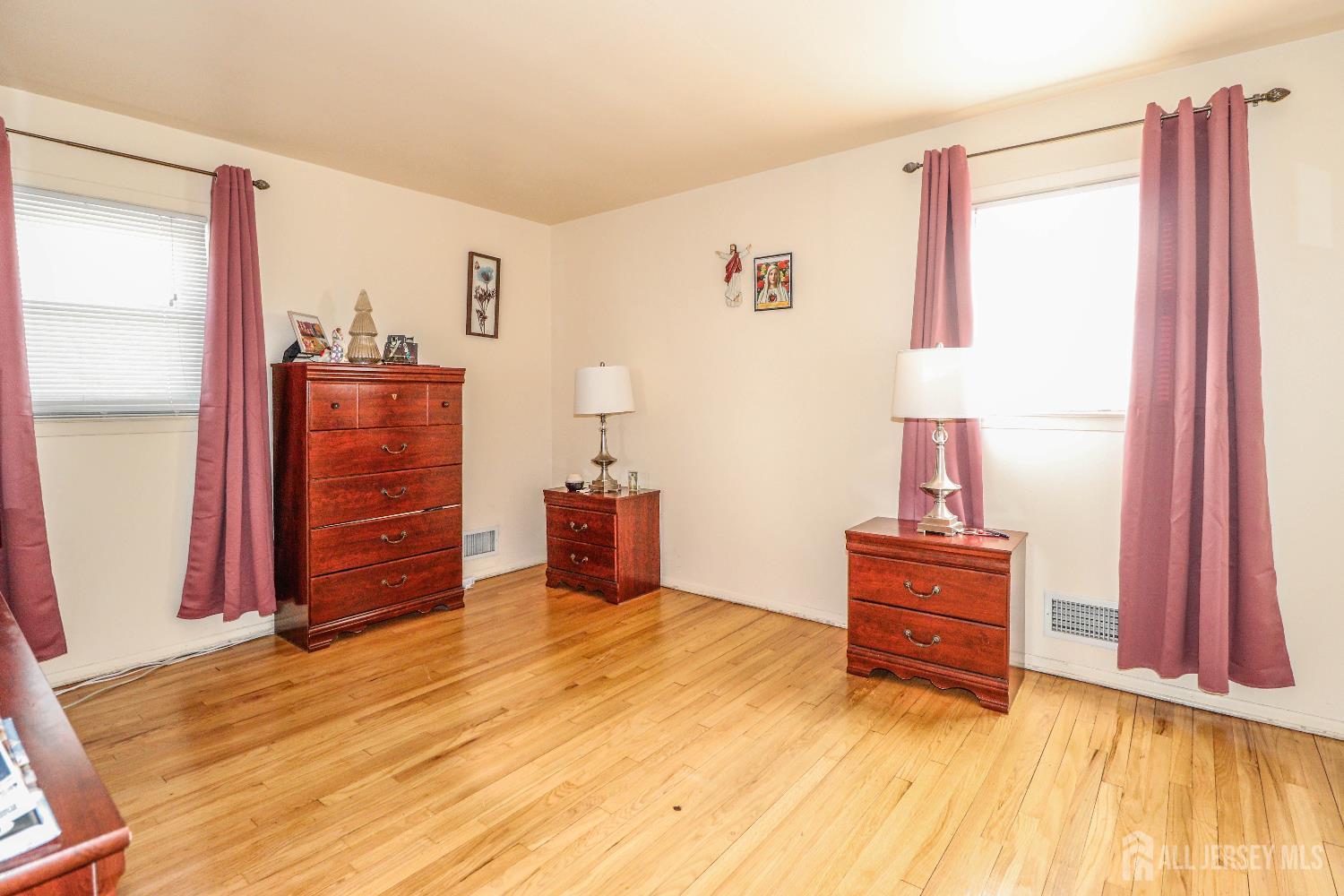 37 Patrick Street Carteret, NJ 07008 - Photo 18 of 30 a view of room with furniture and wooden floor