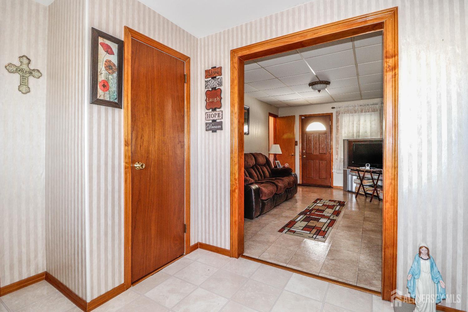 37 Patrick Street Carteret, NJ 07008 - Photo 6 of 30 a view of a livingroom with furniture and a window
