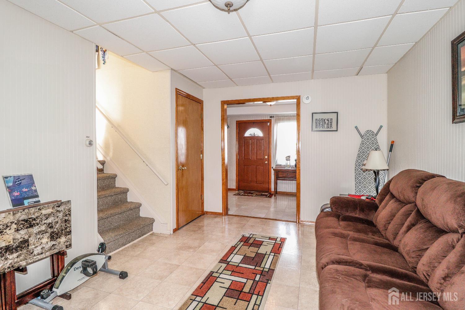 37 Patrick Street Carteret, NJ 07008 - Photo 9 of 30 a living room with furniture and a rug
