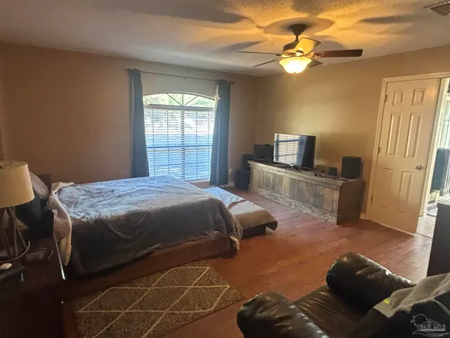 a view of storage and utility room with racks on the wall