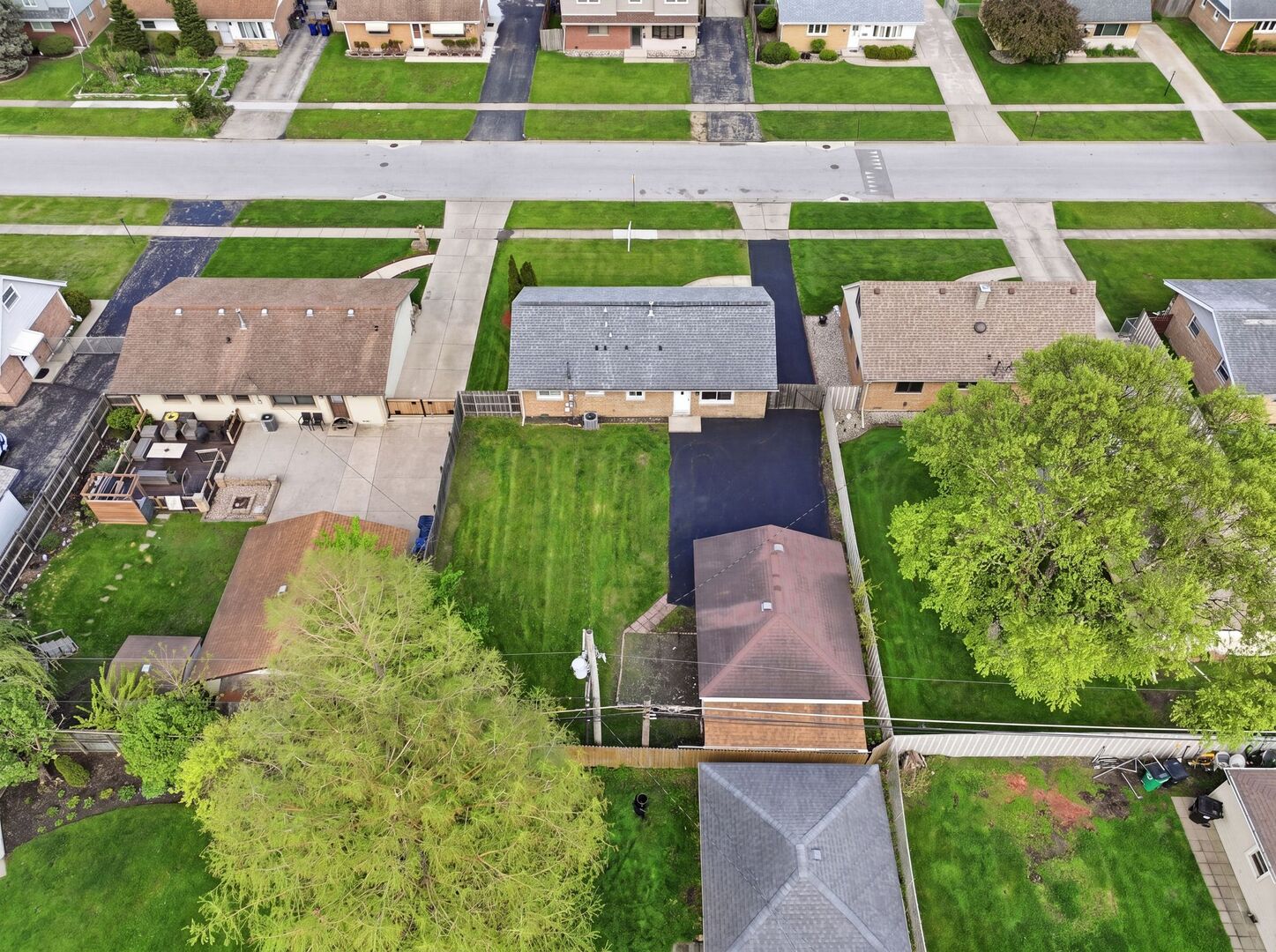 8718 Cranbrook Lane Bridgeview, IL 60455 - Photo 20 of 24 an aerial view of residential houses with outdoor space and street view