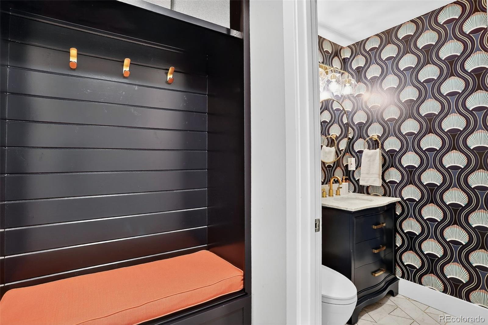 4595 West Lakeridge Road Denver, CO 80219 - Photo 11 of 50 a bathroom with a sink and a toilet