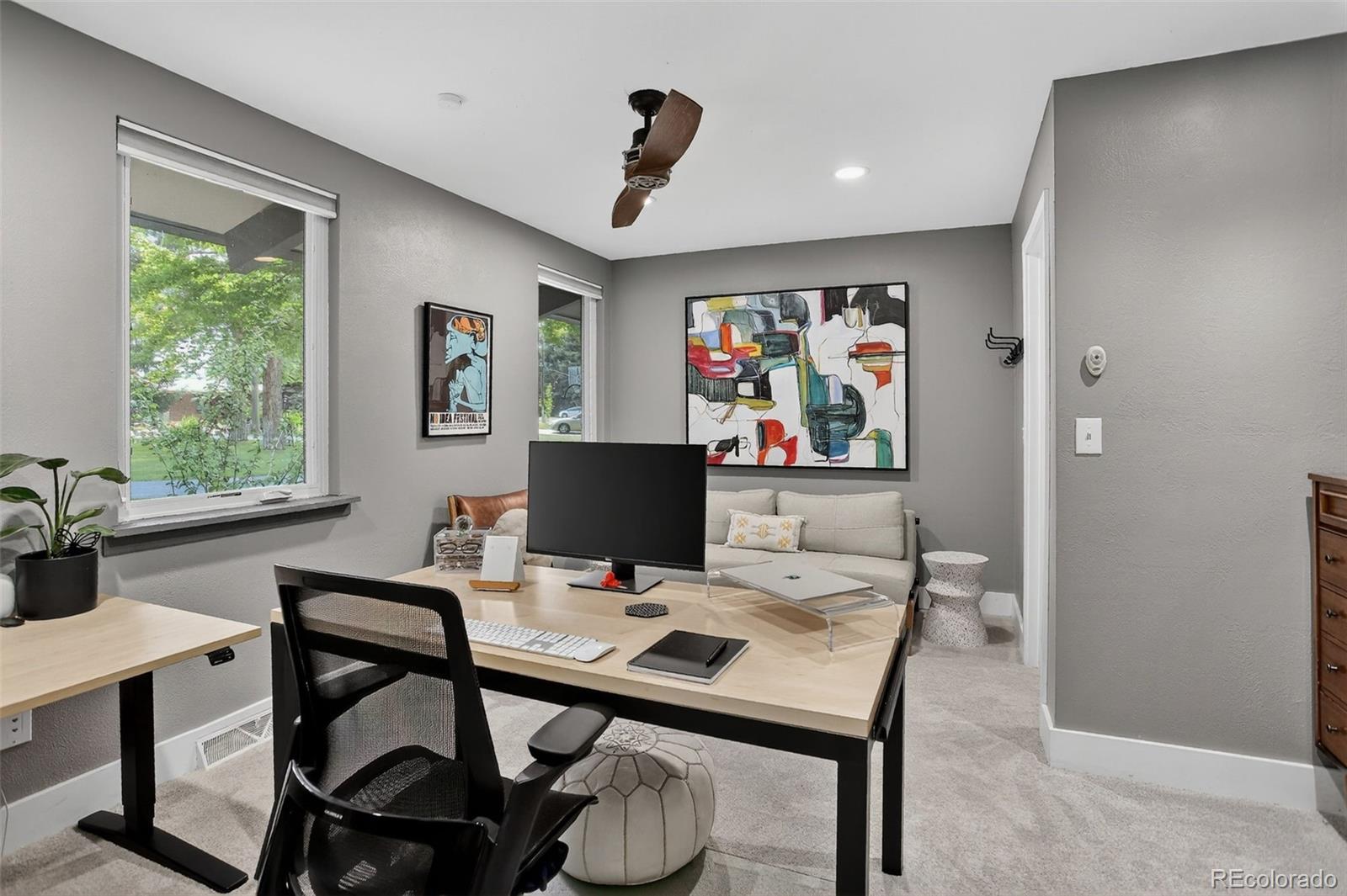 4595 West Lakeridge Road Denver, CO 80219 - Photo 19 of 50 a view of a workspace with furniture and a window