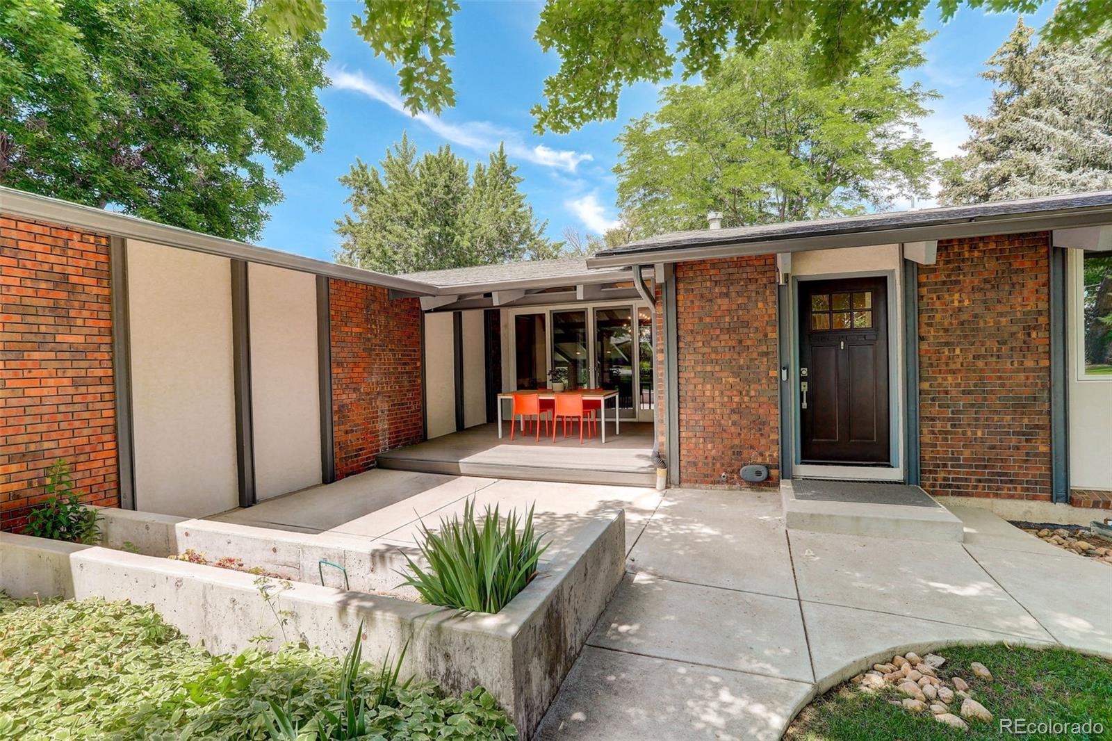 4595 West Lakeridge Road Denver, CO 80219 - Photo 2 of 50 a view of a entryway door front of house