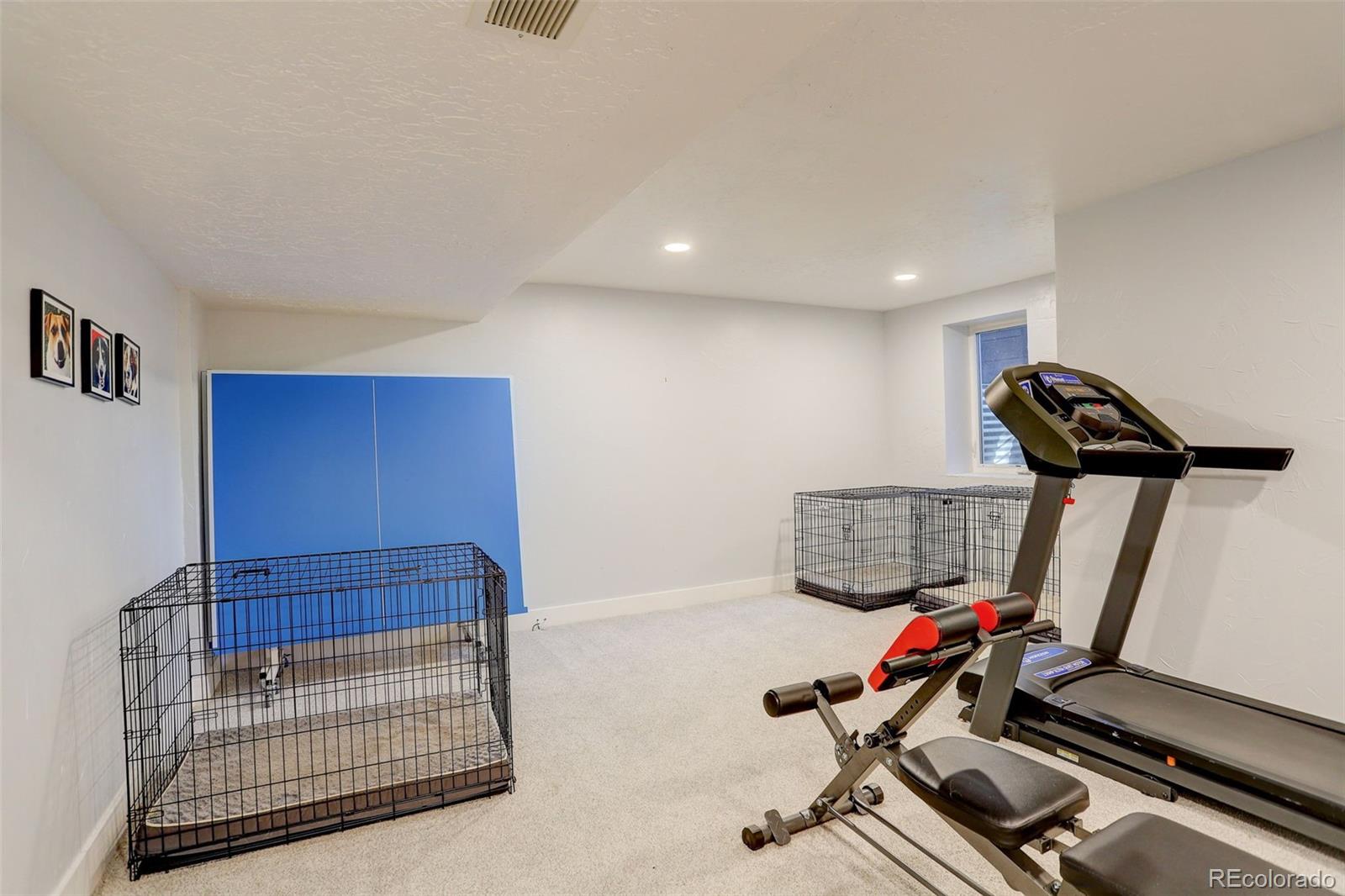 4595 West Lakeridge Road Denver, CO 80219 - Photo 25 of 50 a view of a room with gym equipment