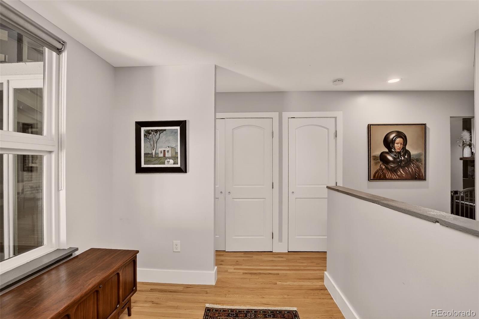 4595 West Lakeridge Road Denver, CO 80219 - Photo 3 of 50 a view of a hallway with workspace