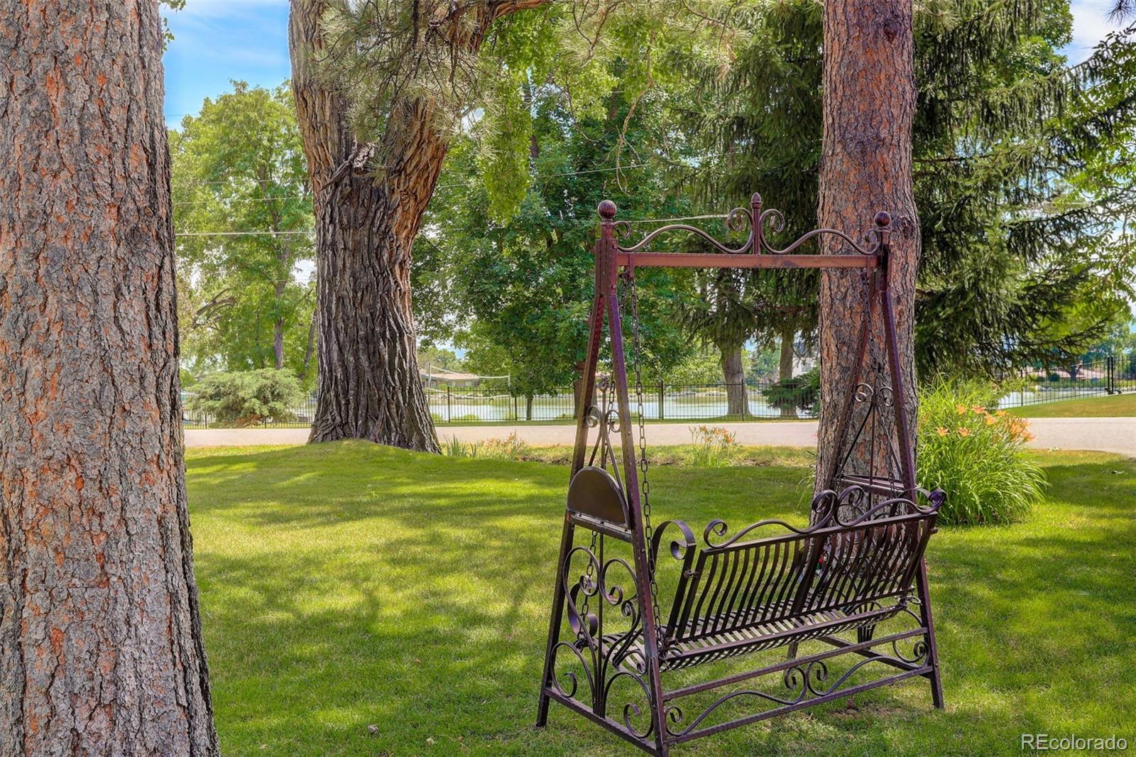 4595 West Lakeridge Road Denver, CO 80219 - Photo 38 of 50 a view of a yard with furniture and garden